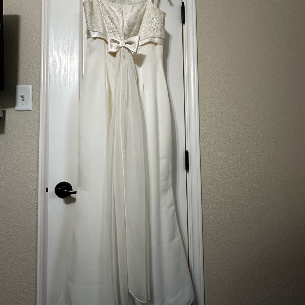 Elegant White Lace Gown with Bow